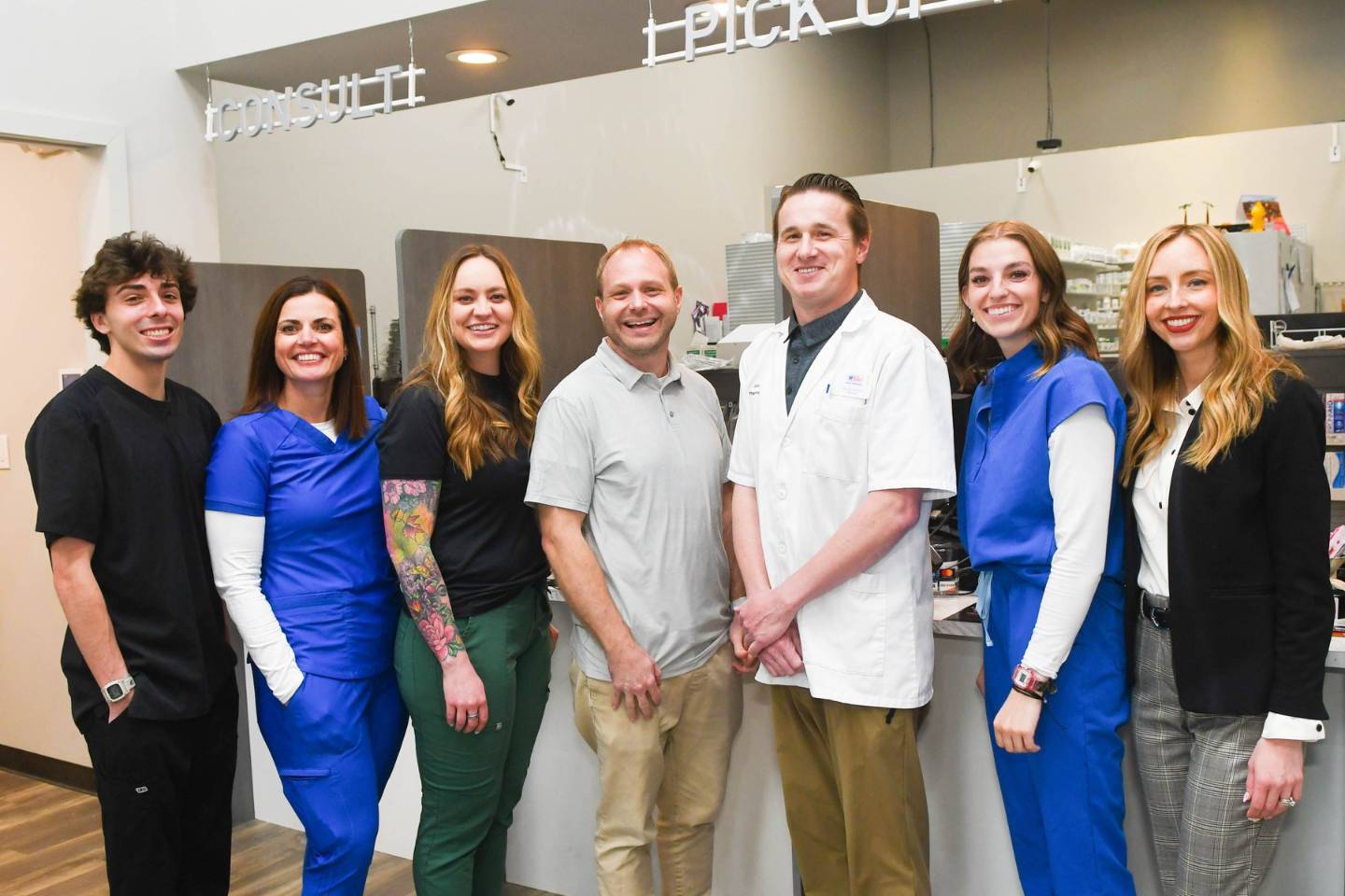 The Mears Pharmacy team behind the pickup counter in Farmington